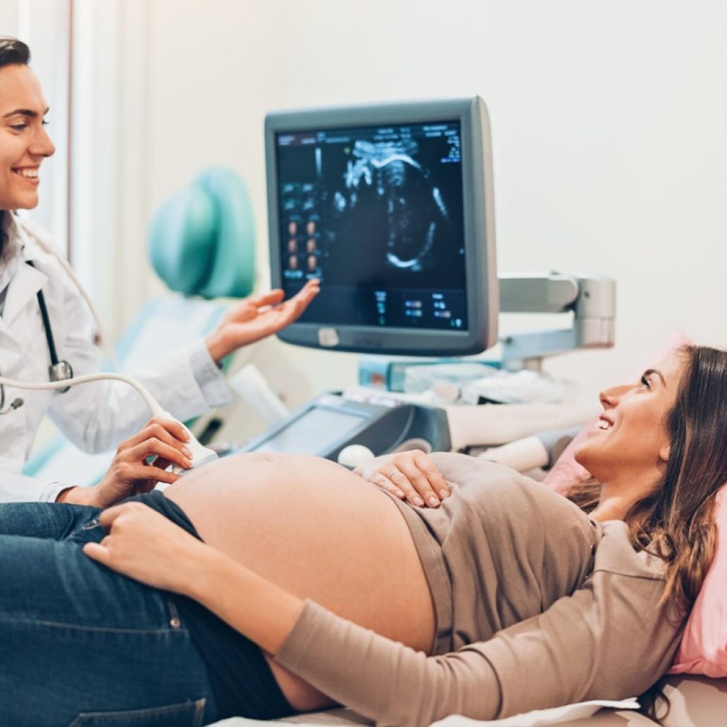 pregnant-woman-watching-her-baby-on-the-ultrasound-picture-id1097354050 pregnant-woman-watching-her-baby-on-the-ultrasound-picture-id1097354050